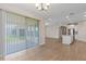 Bright dining area with sliding glass doors leading to the backyard at 9693 Lost Creek Dr, Winter Garden, FL 34787