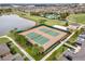 Two tennis courts and a nearby volleyball court at 9693 Lost Creek Dr, Winter Garden, FL 34787