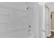 Bathroom with shower/tub combo and built-in shelving at 107 Japonica Dr, Orlando, FL 32807
