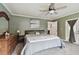 Large bedroom with plush bedding and ample closet space at 1096 N Thorpe Ave, Orange City, FL 32763