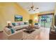 Bright living room with vaulted ceilings and lots of natural light at 1106 Woodbine St, Fern Park, FL 32730