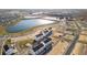 Aerial view of new townhomes and surrounding landscape at 15100 Grove Lake Dr, Winter Garden, FL 34787