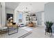 Stylish home office with built-in shelving and a large window at 15100 Grove Lake Dr, Winter Garden, FL 34787