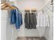 Large walk-in closet with ample shelving and hanging space at 15100 Grove Lake Dr, Winter Garden, FL 34787
