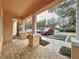 Side view of porch, showing parking area at 1717 Retreat Cir # 00, Clermont, FL 34714