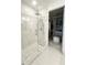 Large walk-in shower with glass enclosure and modern fixtures at 17795 Blazing Star Cir, Clermont, FL 34714