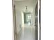 Bright and spacious entryway with tile flooring leading to the living area at 17795 Blazing Star Cir, Clermont, FL 34714