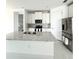 Modern kitchen with white cabinets and stainless steel appliances at 17795 Blazing Star Cir, Clermont, FL 34714