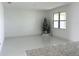 Spacious living room with large windows and neutral colors at 17795 Blazing Star Cir, Clermont, FL 34714