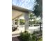 Relaxing pool area with patio furniture and palm trees at 17795 Blazing Star Cir, Clermont, FL 34714