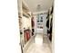 Bright and spacious walk-in closet with ample shelving and hanging space at 17795 Blazing Star Cir, Clermont, FL 34714