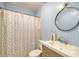 Simple bathroom with shower and vanity at 20 Barry Ave, Mascotte, FL 34753