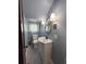 Updated bathroom with vanity, toilet, and stylish fixtures at 2101 Sanford Ave, Sanford, FL 32771