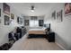 Spacious bedroom with large bed, dresser, and window at 2909 Econ Landing Blvd, Orlando, FL 32825