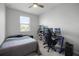 Bedroom with window, carpet flooring, and a workspace at 2909 Econ Landing Blvd, Orlando, FL 32825