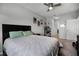 Main bedroom with queen bed and access to bathroom at 2909 Econ Landing Blvd, Orlando, FL 32825