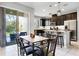 Bright kitchen with granite countertops, island, and stainless steel appliances at 2909 Econ Landing Blvd, Orlando, FL 32825