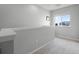 Bright loft area with window and carpet flooring at 2909 Econ Landing Blvd, Orlando, FL 32825