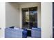 Private patio with seating area and glass sliding doors at 2909 Econ Landing Blvd, Orlando, FL 32825