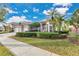 Attractive single-story home with a palm tree and manicured lawn at 3683 Half Moon Dr, Orlando, FL 32812