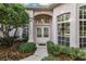 Elegant entryway with double doors and decorative columns at 3683 Half Moon Dr, Orlando, FL 32812