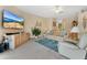 Relaxing Gathering room with a large TV, comfortable seating, and a neutral color palette at 3683 Half Moon Dr, Orlando, FL 32812