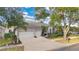 Two-story house with three-car garage at 3683 Half Moon Dr, Orlando, FL 32812
