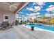 Spacious screened pool and patio dining area at 3683 Half Moon Dr, Orlando, FL 32812