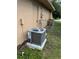 High-efficiency central AC unit located outside near the house at 620 Heraldo Ct, Kissimmee, FL 34758