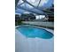 Refreshing screened pool perfect for relaxation at 620 Heraldo Ct, Kissimmee, FL 34758