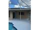 Enjoy this relaxing pool area with covered patio at 620 Heraldo Ct, Kissimmee, FL 34758