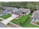 Aerial view of a single-Gathering home with a manicured lawn and mature trees at 654 Boniview Ln, Altamonte Springs, FL 32714