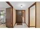 A look at the home's interior foyer and front door with tile floors at 654 Boniview Ln, Altamonte Springs, FL 32714