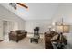 Comfortable living room with a ceiling fan, sofa, and large window for natural light at 654 Boniview Ln, Altamonte Springs, FL 32714
