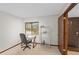 Home office featuring neutral carpet, desk and shelving at 654 Boniview Ln, Altamonte Springs, FL 32714