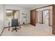 Office space featuring a light filled window and neutral carpet at 654 Boniview Ln, Altamonte Springs, FL 32714