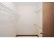 Spacious walk-in closet with ample shelving and a wooden hanging rod at 654 Boniview Ln, Altamonte Springs, FL 32714