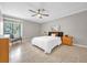 Bright bedroom with ceiling fan and ample closet space at 670 Lake Villas Dr # D, Altamonte Springs, FL 32701