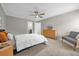 Main bedroom with ceiling fan and en-suite bathroom at 670 Lake Villas Dr # D, Altamonte Springs, FL 32701