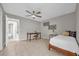 Bedroom with a bed, desk, and view of the bathroom at 670 Lake Villas Dr # D, Altamonte Springs, FL 32701