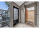 Condo entry with exterior view and wood door at 670 Lake Villas Dr # D, Altamonte Springs, FL 32701
