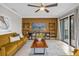 Spacious living room featuring a large TV and comfortable sofa at 670 Lake Villas Dr # D, Altamonte Springs, FL 32701