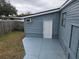 Private backyard with a patio and storage shed at 6845 Pompeii Rd, Orlando, FL 32822