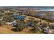Aerial showcasing home location in a golf course community at 8835 Spyglass Loop, Clermont, FL 34711