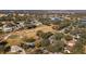 Aerial view of home and surrounding golf course community at 8835 Spyglass Loop, Clermont, FL 34711
