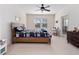 Spacious bedroom with Star Wars bedding, ceiling fan, and desk at 9218 Shepton St, Orlando, FL 32825