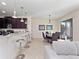 Open dining area with glass table, dark chairs, and access to a patio at 9218 Shepton St, Orlando, FL 32825