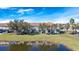 Townhome with lake view, private patio, and fenced yard at 9218 Shepton St, Orlando, FL 32825