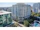 A stunning exterior elevation of a condo building with multi-story views and modern architecture at 100 S Eola Dr # 1405, Orlando, FL 32801