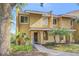 Charming townhome with walkway and lush landscaping at 1007 Baseball And Boardwalk Ct, Kissimmee, FL 34746